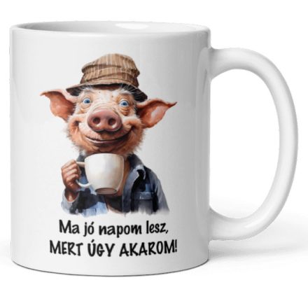 Ma jó napom lesz, mert úgy akarom feliratú fehér kerámia bögre kávéscsészét fogó mosolygós malac grafikájával
