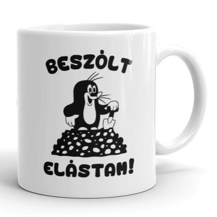 Beszólt elástam feliratú fehér kerámia bögre ásót tartó Kisvakond és fekete vakondtúrás rajzolt grafikájával.