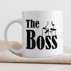 The Boss feliratú fehér kerámia bögre fekete marionett irányító kéz grafikájával