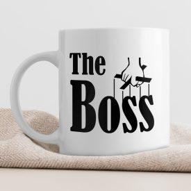 The Boss feliratú fehér kerámia bögre fekete marionett irányító kéz grafikájával